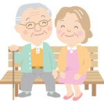 ベンチに座る高齢者夫婦